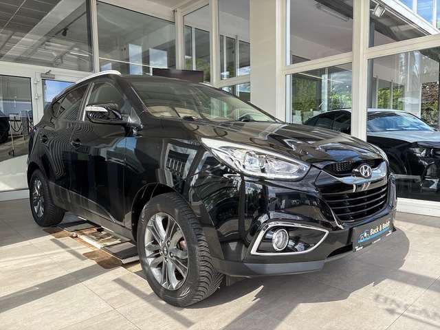 Hyundai Tucson blue Style 1.6i*NAVI,RFK,SITZHEIZUNG,EPH*