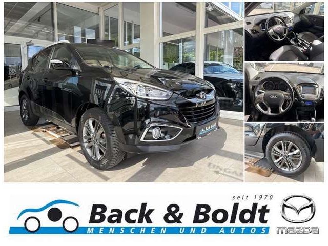 Hyundai Tucson blue Style 1.6i*NAVI,RFK,SITZHEIZUNG,EPH*