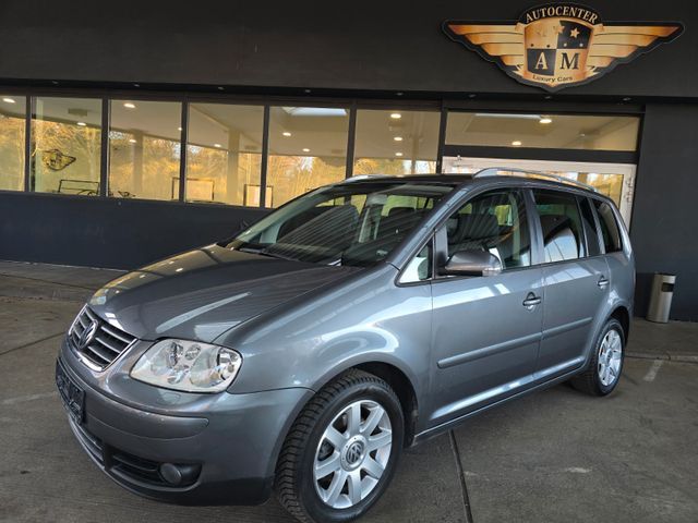 VW Touran 2.0 TDI Highline 7.Sitzer/NAVI/PDC/AHK